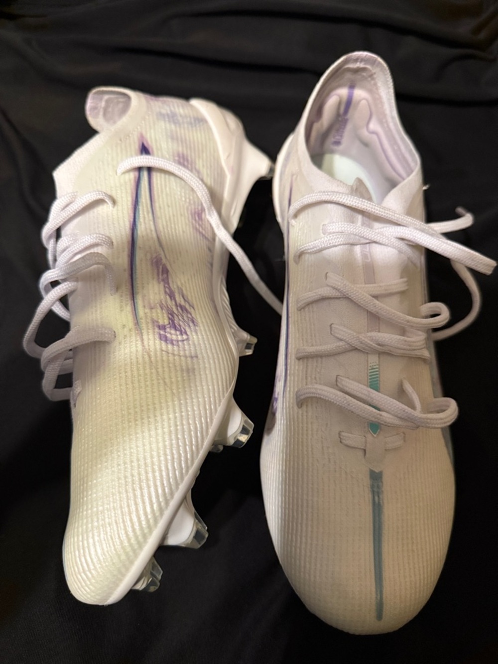 Puma White Athletic Cleats with Light Purple Accents
